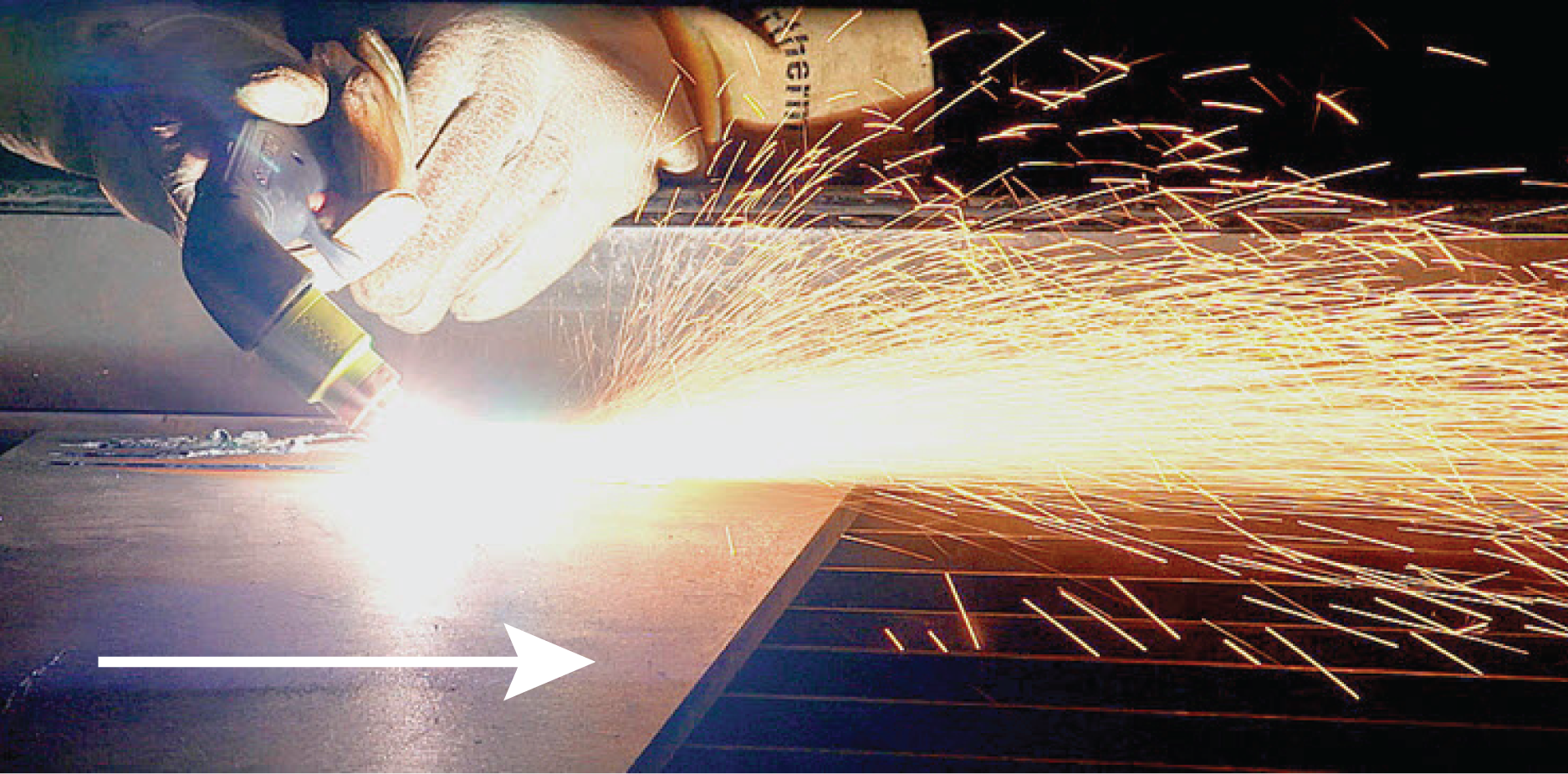 This image shows a torch gouging and identifies the direction of travel.