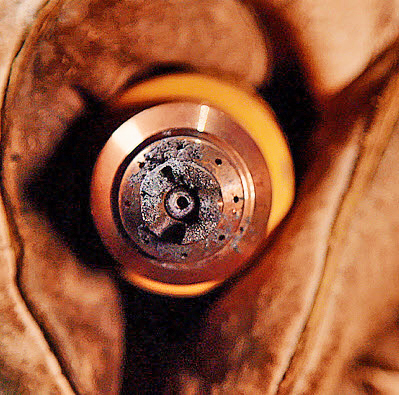 This image shows a cartridge with buildup on it.