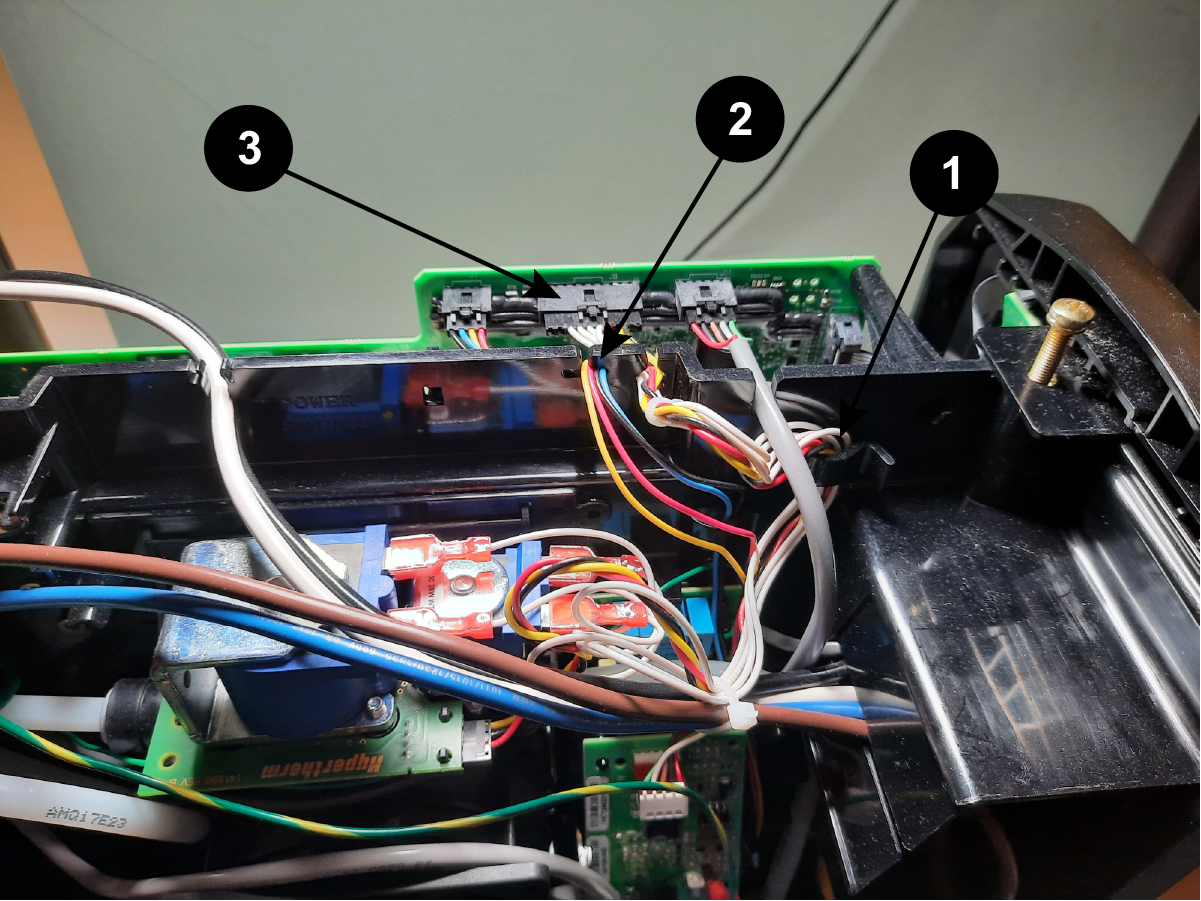 The image shows the proper wire routing for the solenoid valve.